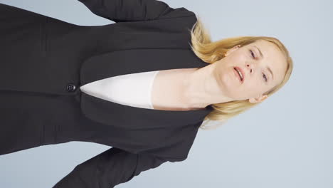 Vertical-video-of-Yawning-business-woman.
